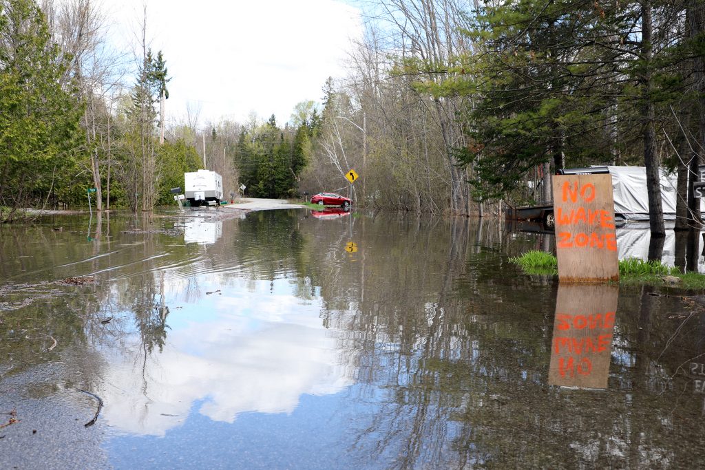 Flooding has overtaken a large section of Moorhead Drive through Willola Beach. Photo by Jake Davies