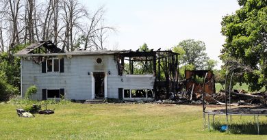 A photo of a house destroyed by fire.