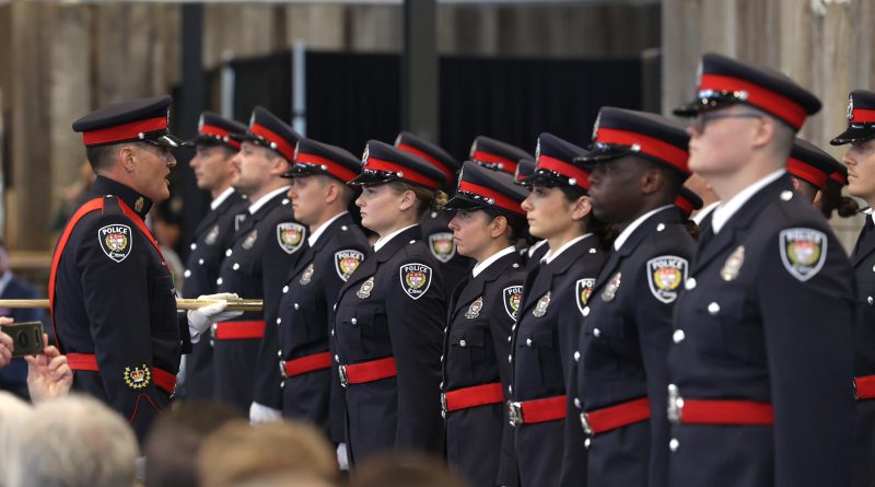 A photo of new recruits at the badge ceremony.