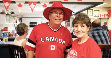 Two people pose for a photo at the Legion on Canada Day.