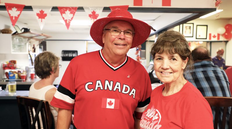Two people pose for a photo at the Legion on Canada Day.