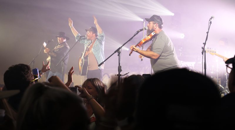 A band performs music.