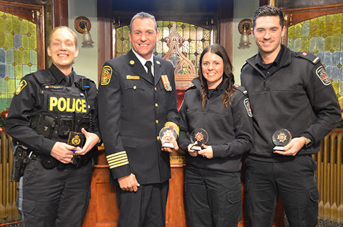 Four emergency responders pose for a photo.