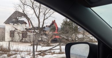 A photo of a house being demolished.