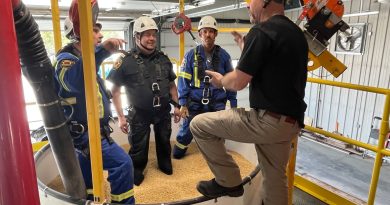 A photo of people working on silo safety.