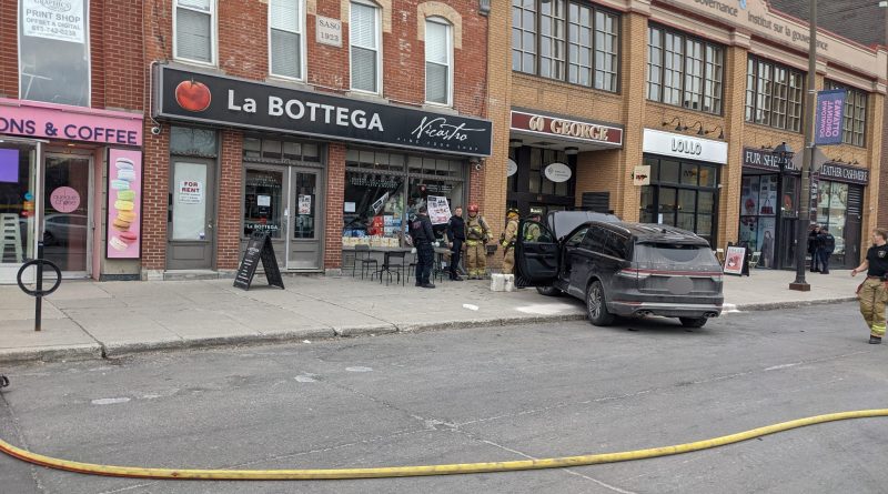 A car crashed in to a building.