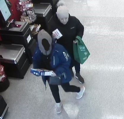 A photo of two suspects.