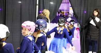 Skaters wait to hit the ice.