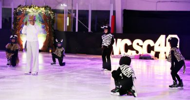 Skaters peform on the ice.