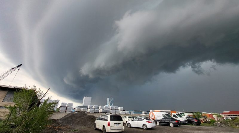 A photo of a dark cloud over the city.