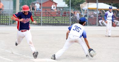 A player runs to first base.