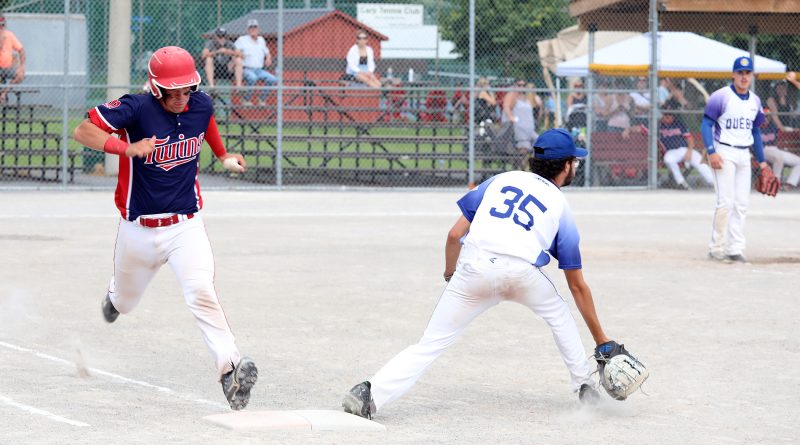 A player runs to first base.