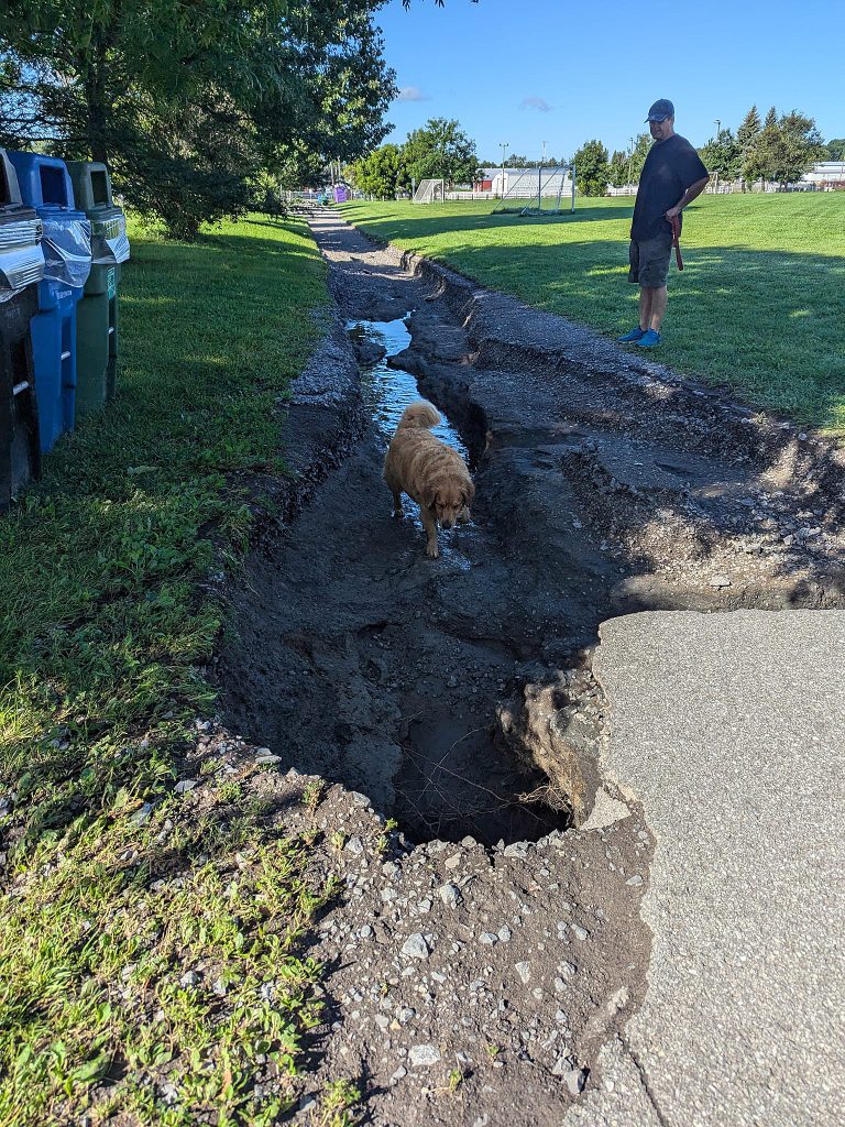 A trail is badly damaged by the rain.