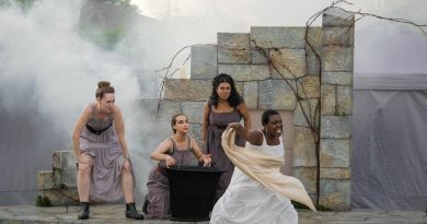 Witches dance during a production of MacBeth.