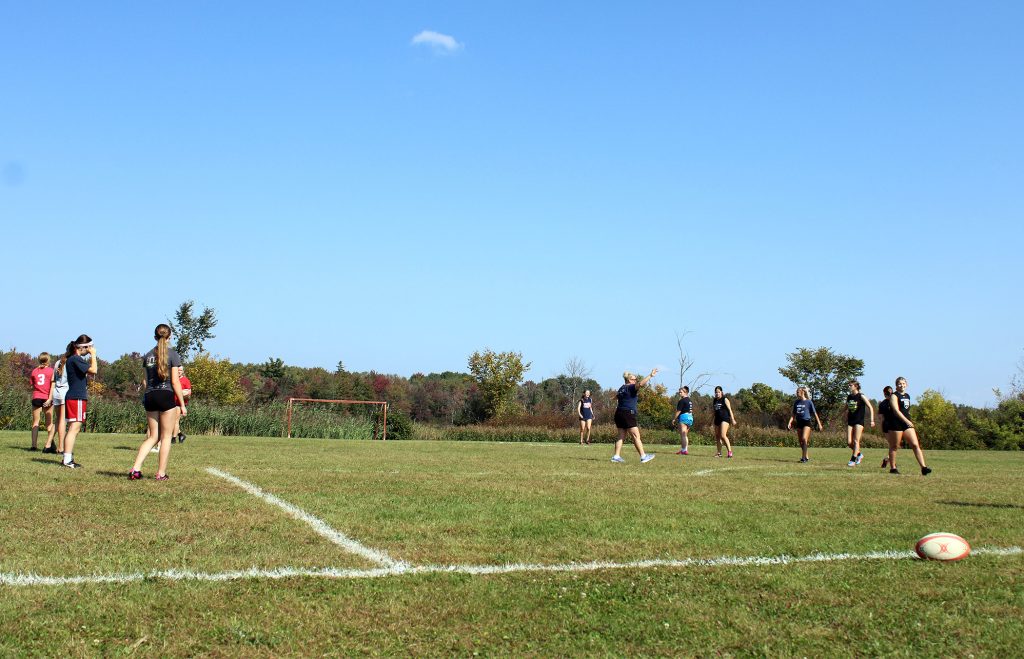 A photo of a rugby practice.