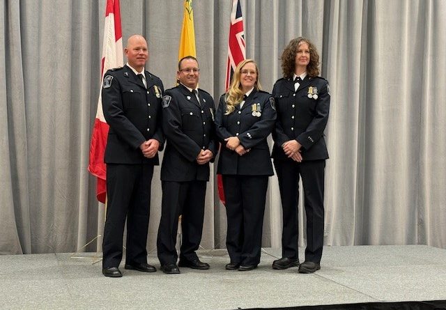 A photo of four paramedics.