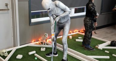 A photo of a ghoul playing mini-putt.