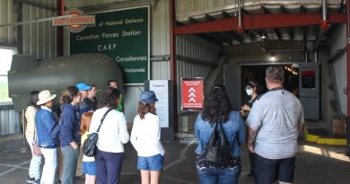 People stand in the entrance to the museum.