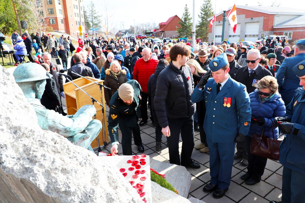 A soldier salutes during a Remembrance Day service.