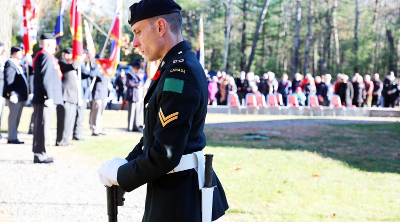 A man stands at guard during a Remembrance Day service.