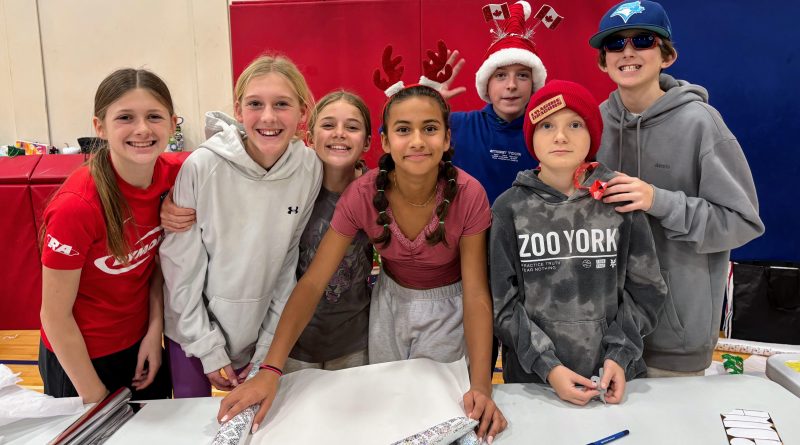 A group of students pose for a photo.