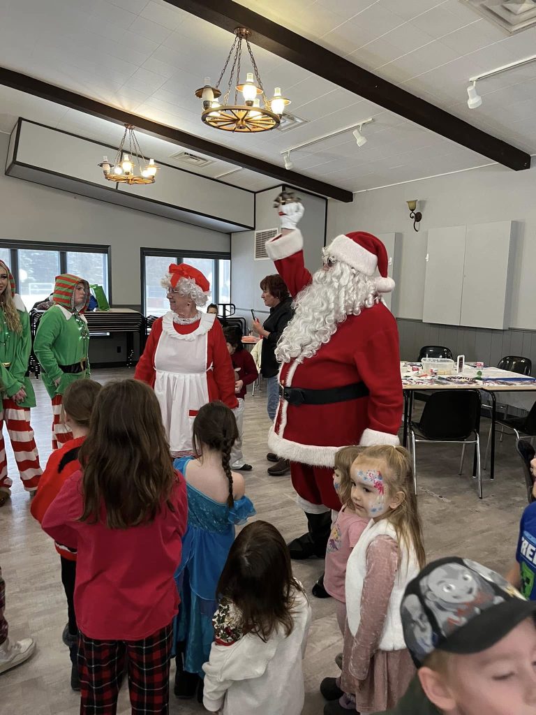 Kids talk to Santa.