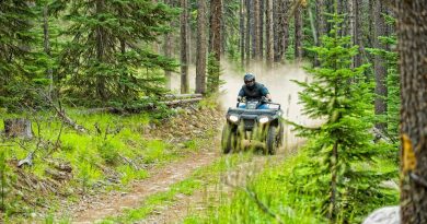 A photo of an ATV on a trail.