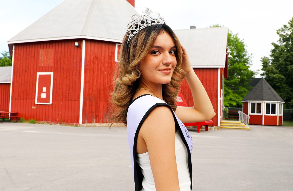 Miss Teenage Ottawa poses in front of the CAS Exhibit Hall.