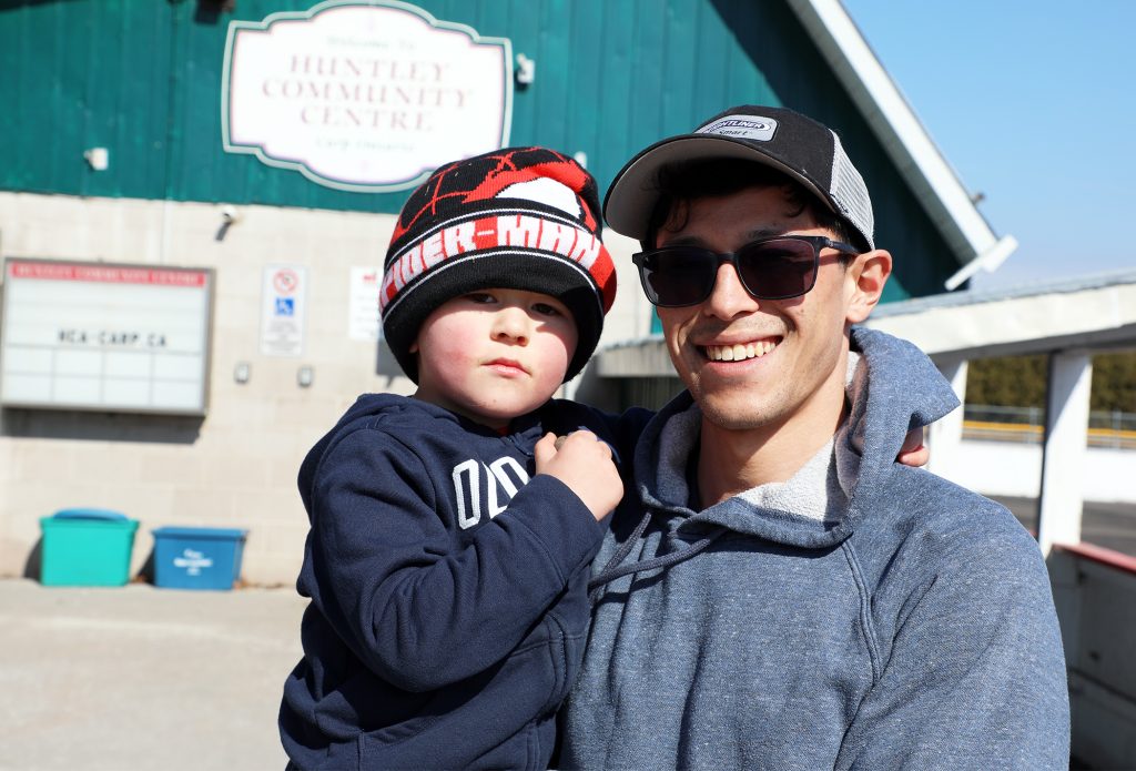 Two people pose for a photo.