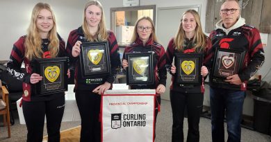 Team Frlan poses with their Team Ontario heart patches.