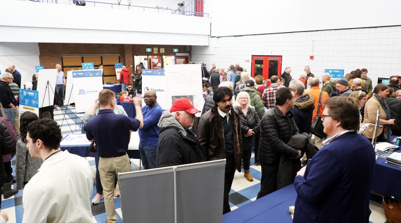 A photo of a packed cafeteria.