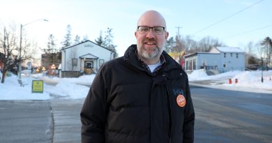 A man stands in downtown Carp.