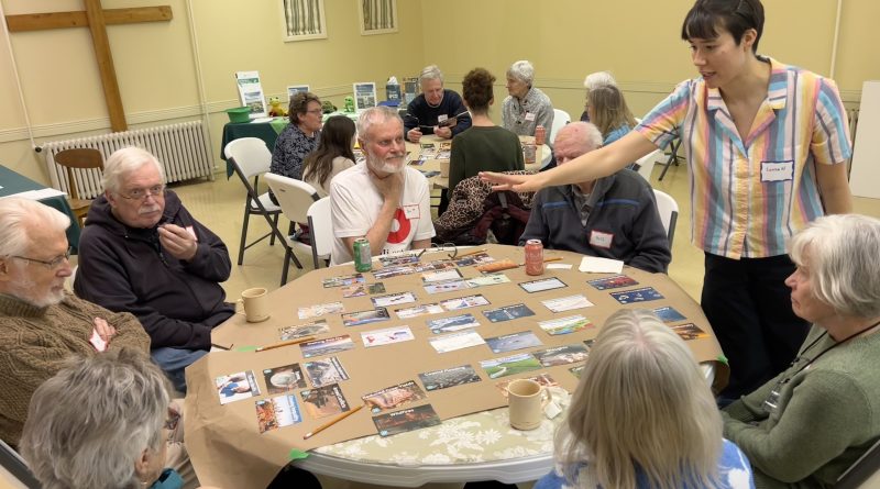 A photo of people playing a board game.