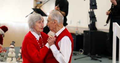 Two people dance.