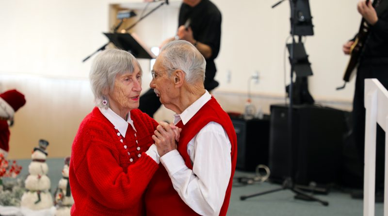 Two people dance.