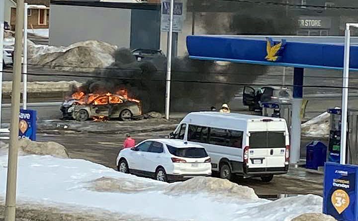 A photo of a car on fire.