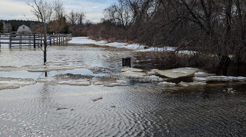 A photo of a flooded road.