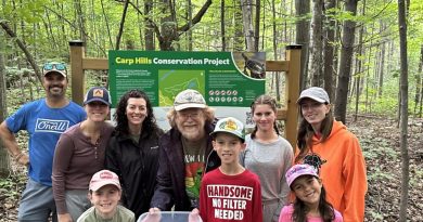 A group of people pose for a photo.