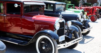 A photo of antique cars.