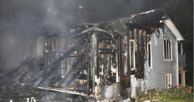 A photo of a burnt house.