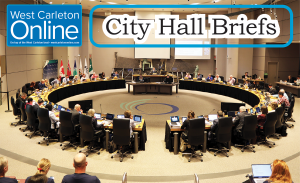 A column header with a photo of city hall.