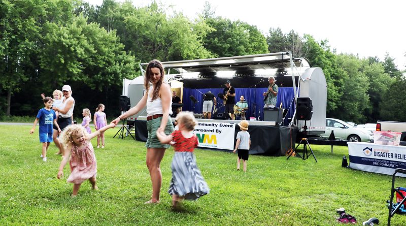 A photo of people dancing to live music.