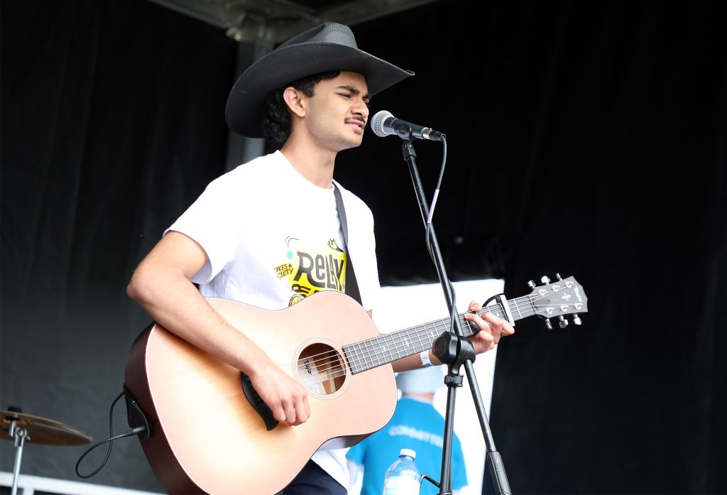 A person plays the guitar.