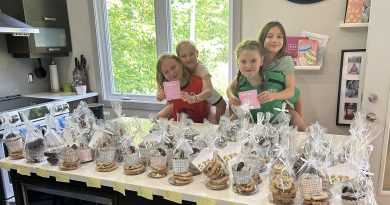 Four youth pose with their baked goods.