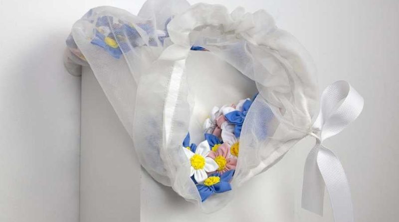 A photo of art with flowers.