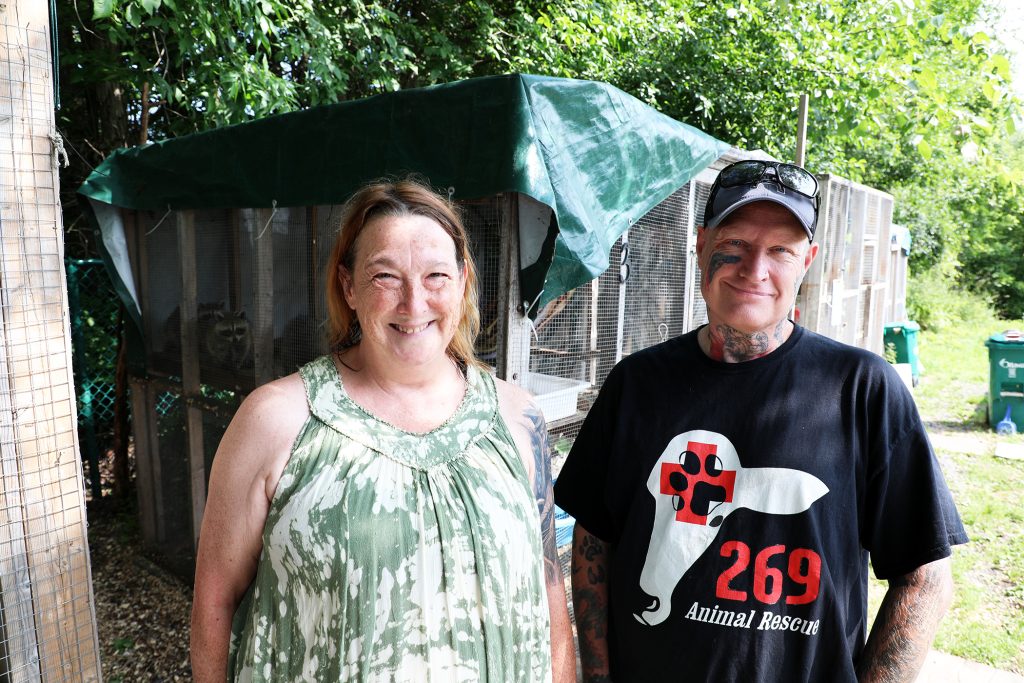 Two people pose for a photo.