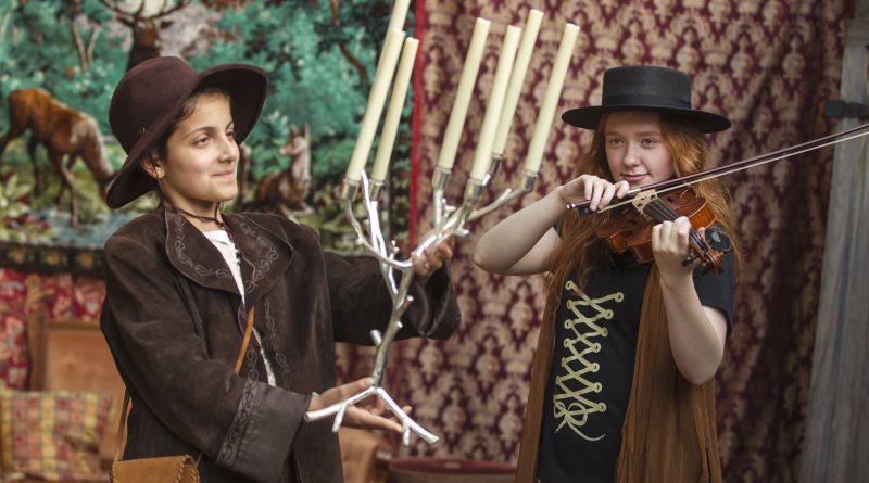 Ywo young actors perform Shakespeare.