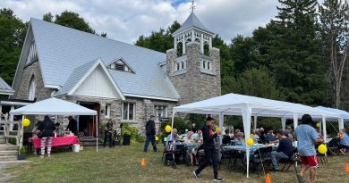 A photo of tents and a church.