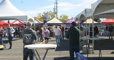 A photo of people enjoying a beer festival.