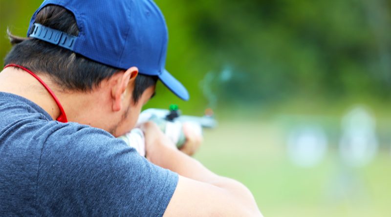 A person lines up a shot.